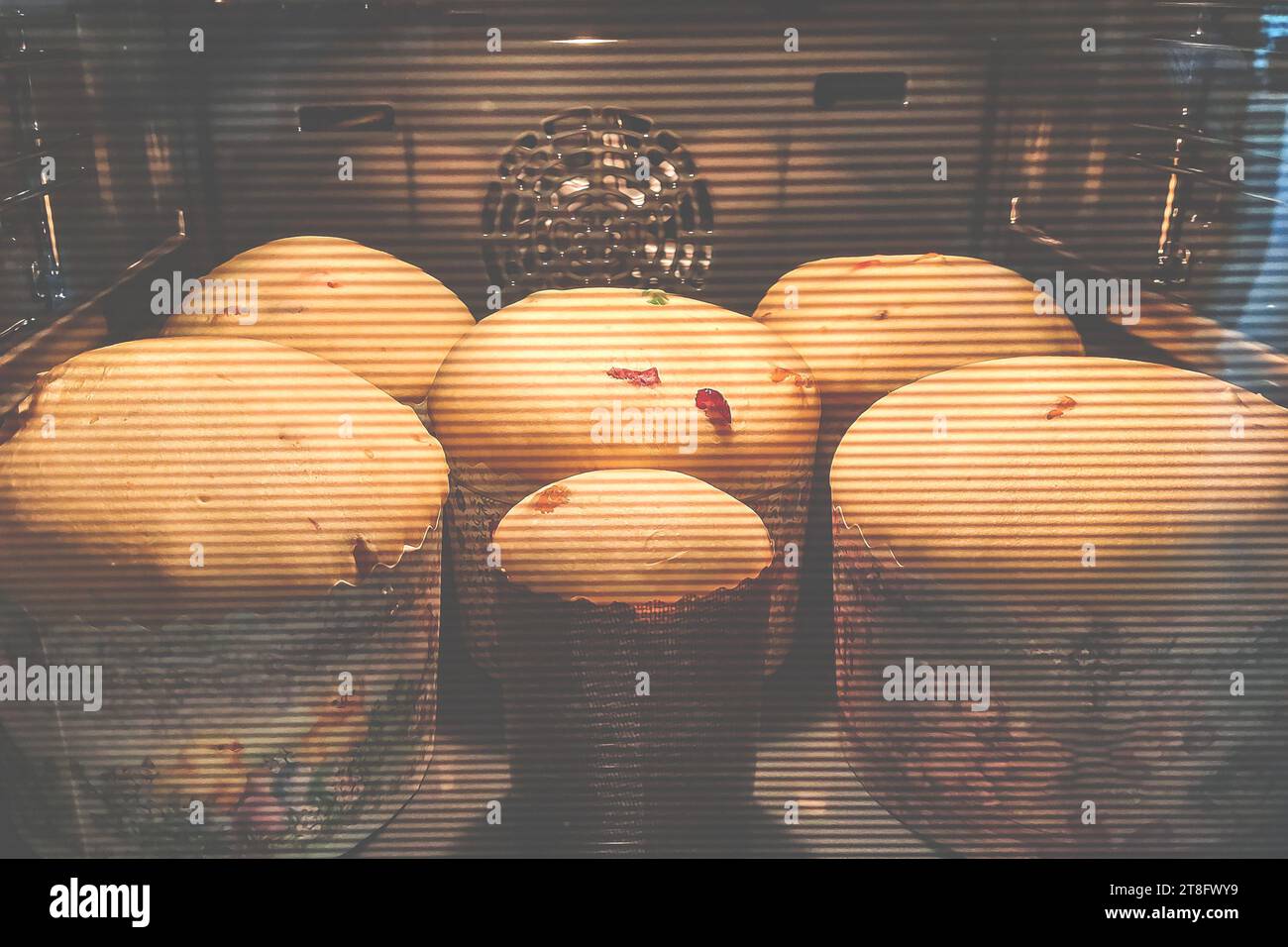 Traditional yeast Easter bread is baked in the oven. Easter cake Stock Photo