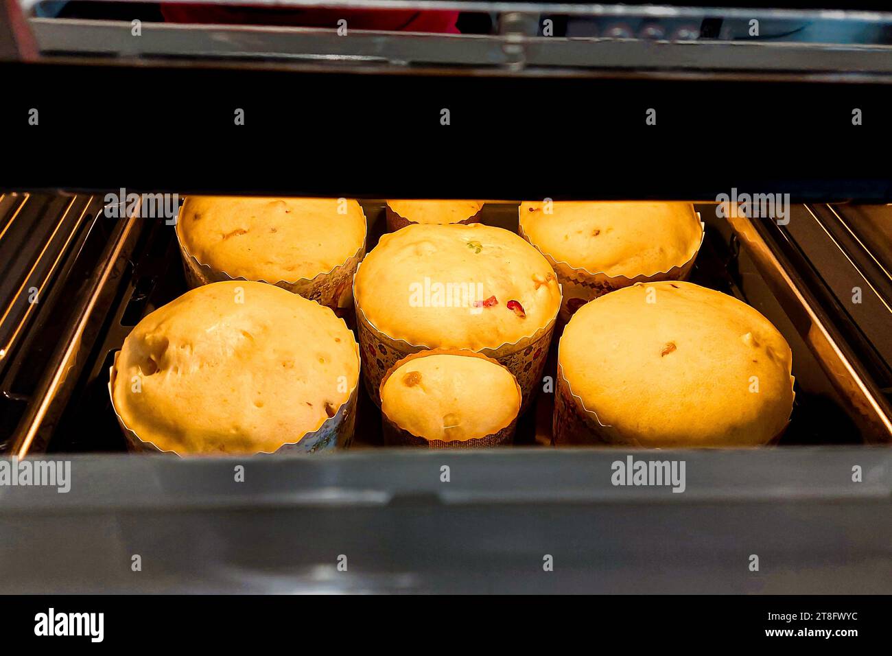 Traditional yeast Easter bread is baked in the oven. Easter cake Stock Photo