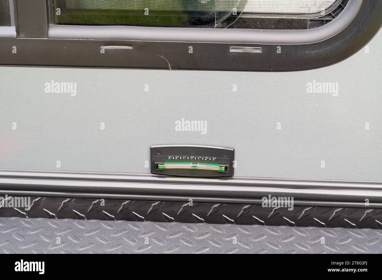A bubble level attached to the side of a RV Stock Photo Alamy