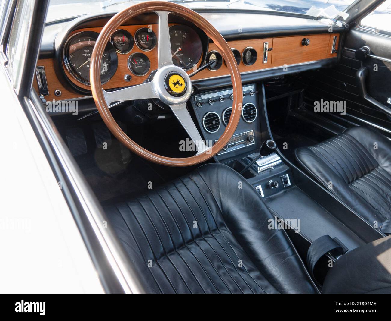 1960s Ferrari 330 GT cabin interior steering wheel and dashboard. Nice, France - June 8, 2023. Stock Photo