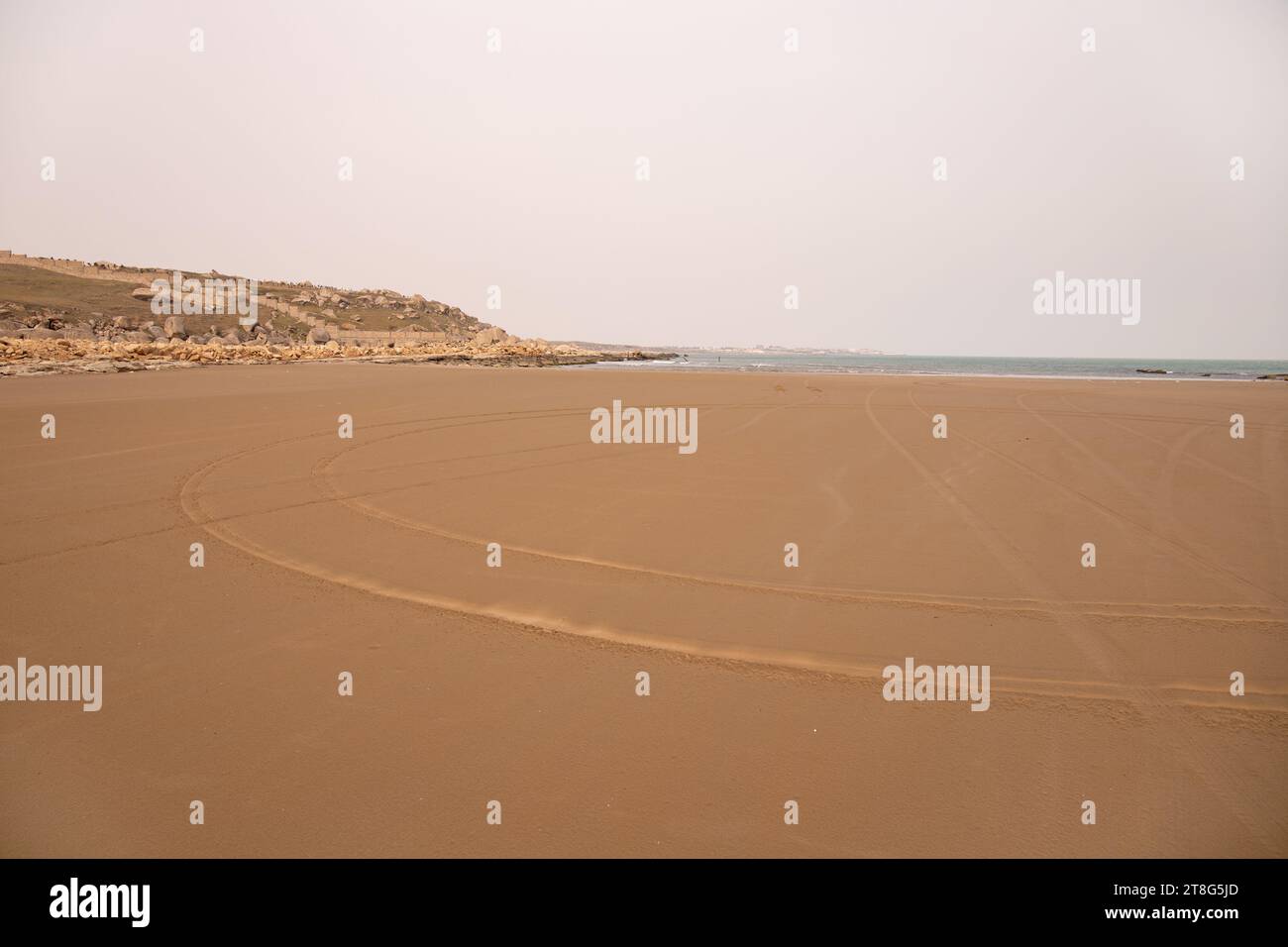 Traces from the car on the shore of the Caspian Sea. Stock Photo