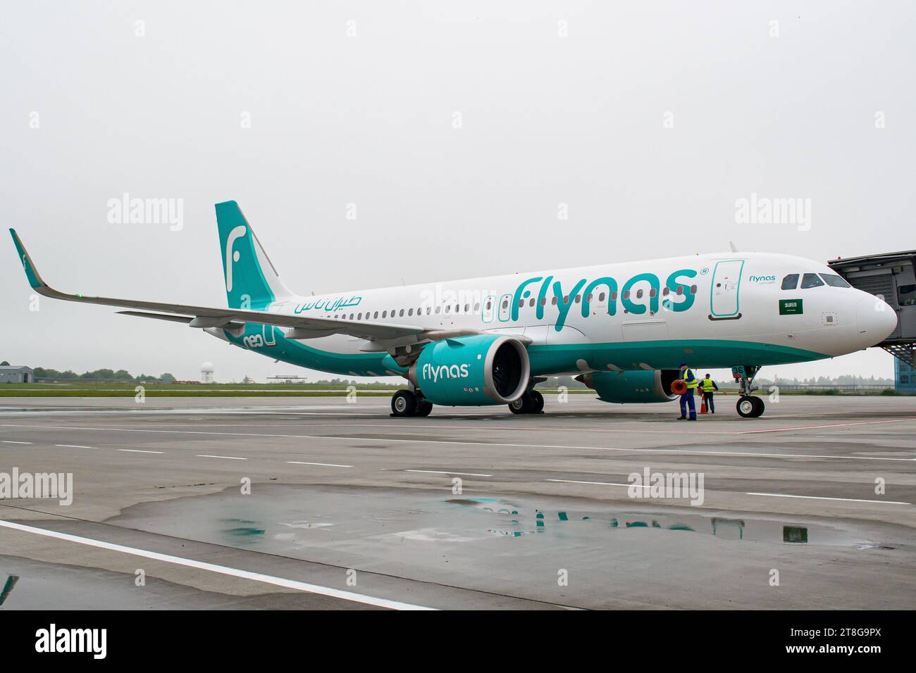Flynas Airbus A320 NEO parked at gate after arriving to Lviv Airport for the first time. High-quality photo Stock Photo