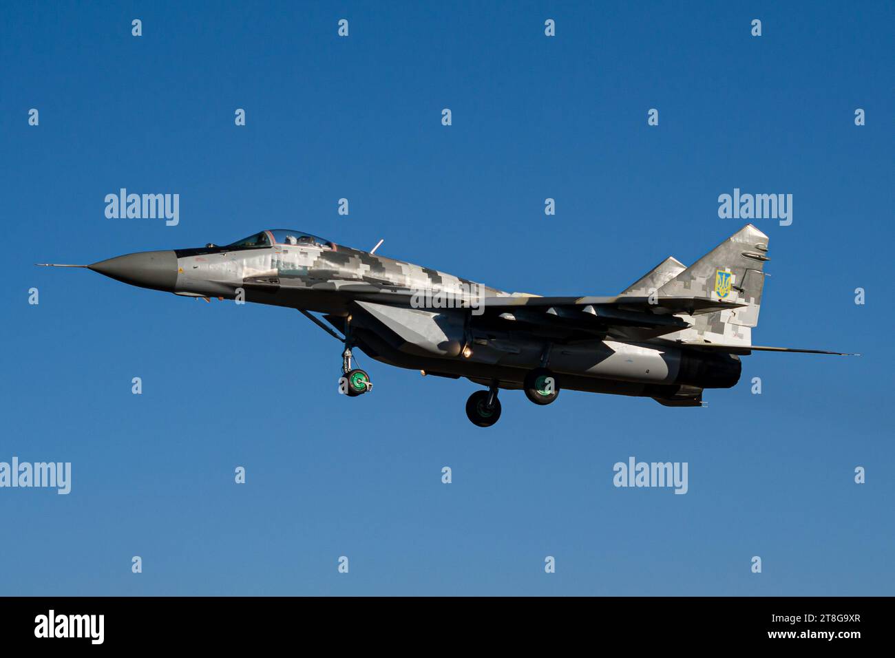 Ukrainian fighter jet in flight with gears down Stock Photo