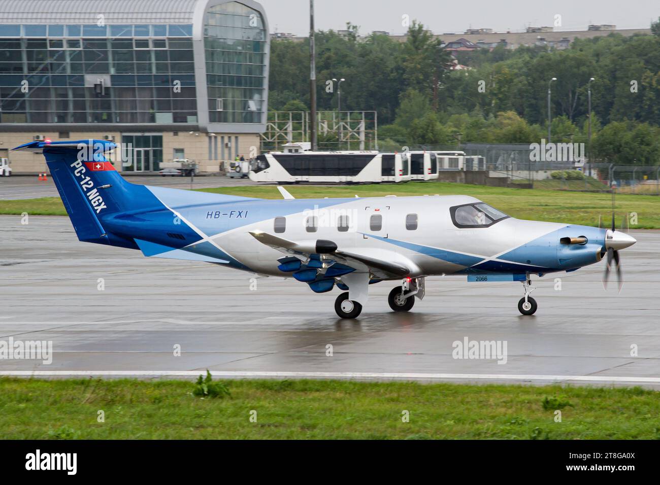 Private Pilatus PC-12 NGX aircraft taxiing for takeoff from Lviv Stock Photo