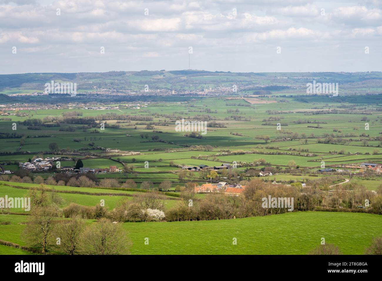 The view across Queen's Sedge Moor to the city of Wells and the Mendip Hills from Glastonbury Tor in Somerset. Stock Photo