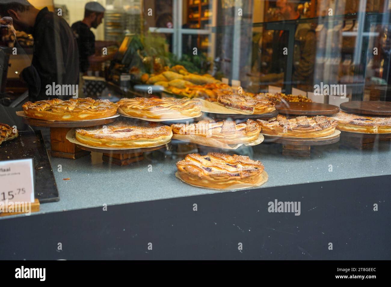 Limurgse vlaai, typical pie or dutch tart, on display in window pastry shop, Limburg, Maastricht, Southern Netherlands. Stock Photo
