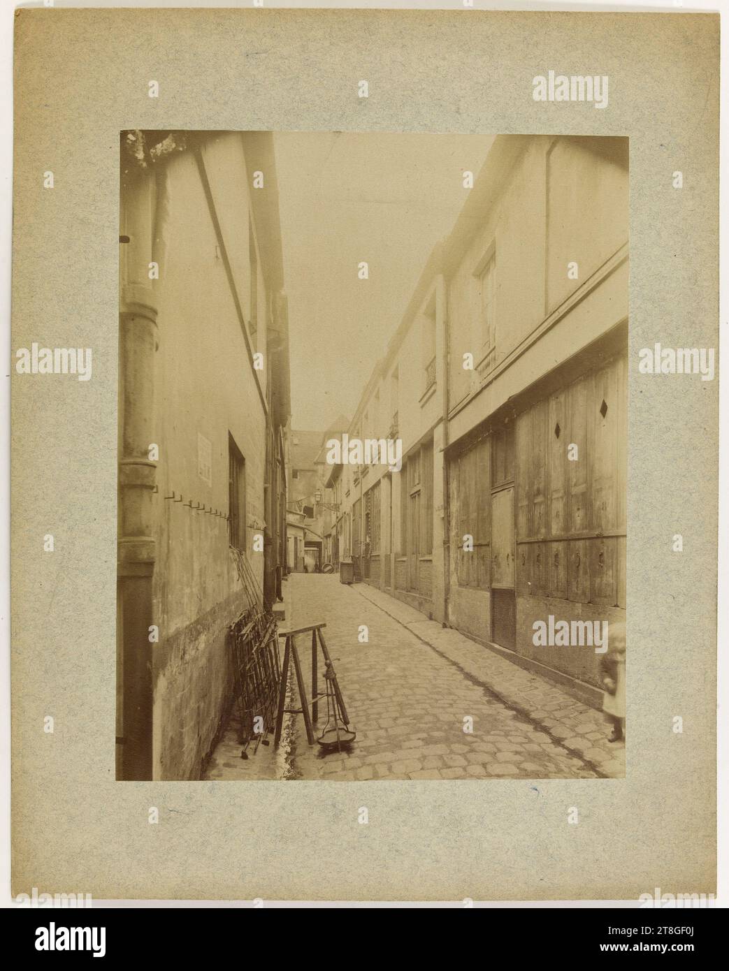 Alley with child, Photographer, 19th-20th century, Photography, Graphic arts, Photography, Albumen print, Dimensions - Work: Height: 21.8 cm, Width: 17.2 cm Stock Photo