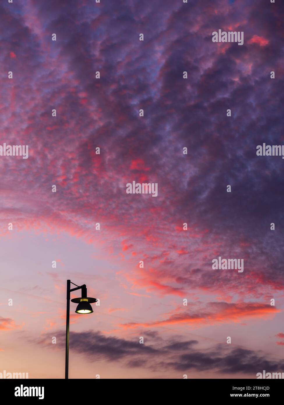 Red sky at morning over Gothenburg skyline with lamp post Stock Photo ...