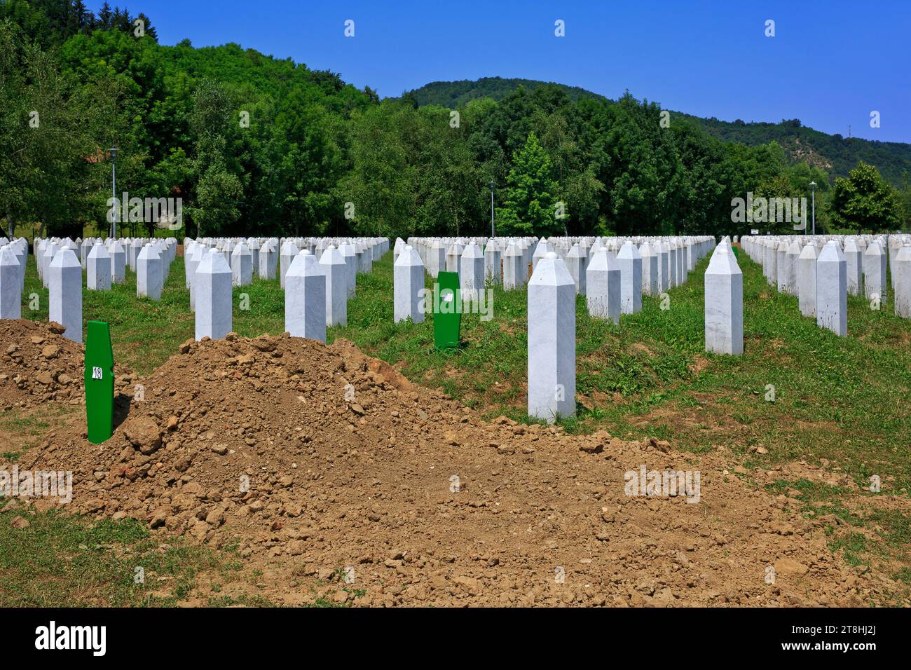 Freshly dug graves of recently identified muslim victims of the Srebrenica Genocide (1995) at Potocari, Bosnia and Herzegovina Stock Photo