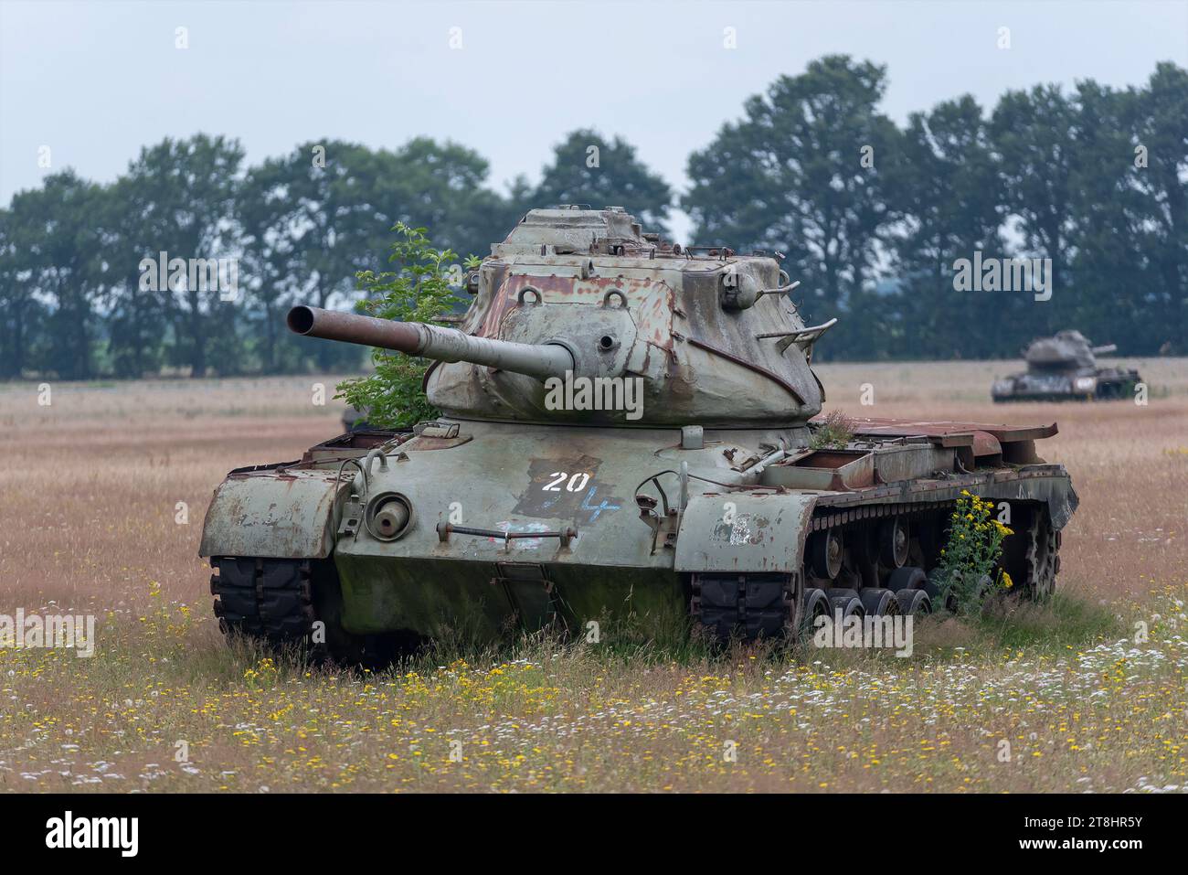 Sögel, Germany - Focus on abandoned American tanks in the middle of a field in Germany. In total there are 24 tanks in this field. Stock Photo