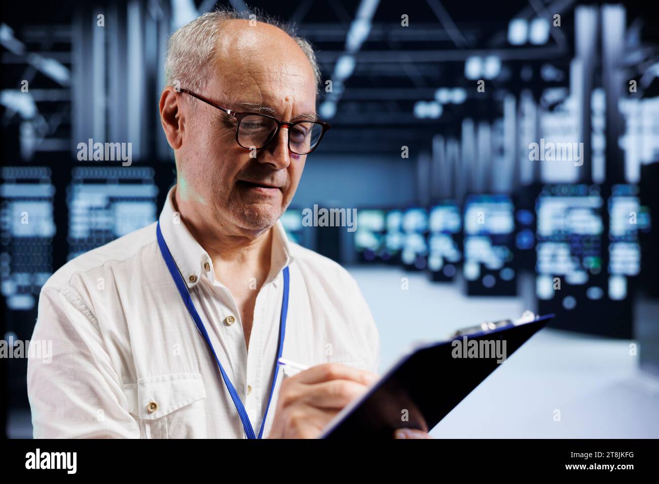 Senior engineer in crypto server farm with specialized hardware using Blockchain technology for cryptocurrency mining. Fintech expert using asic rigs to solve complex computational problems Stock Photo