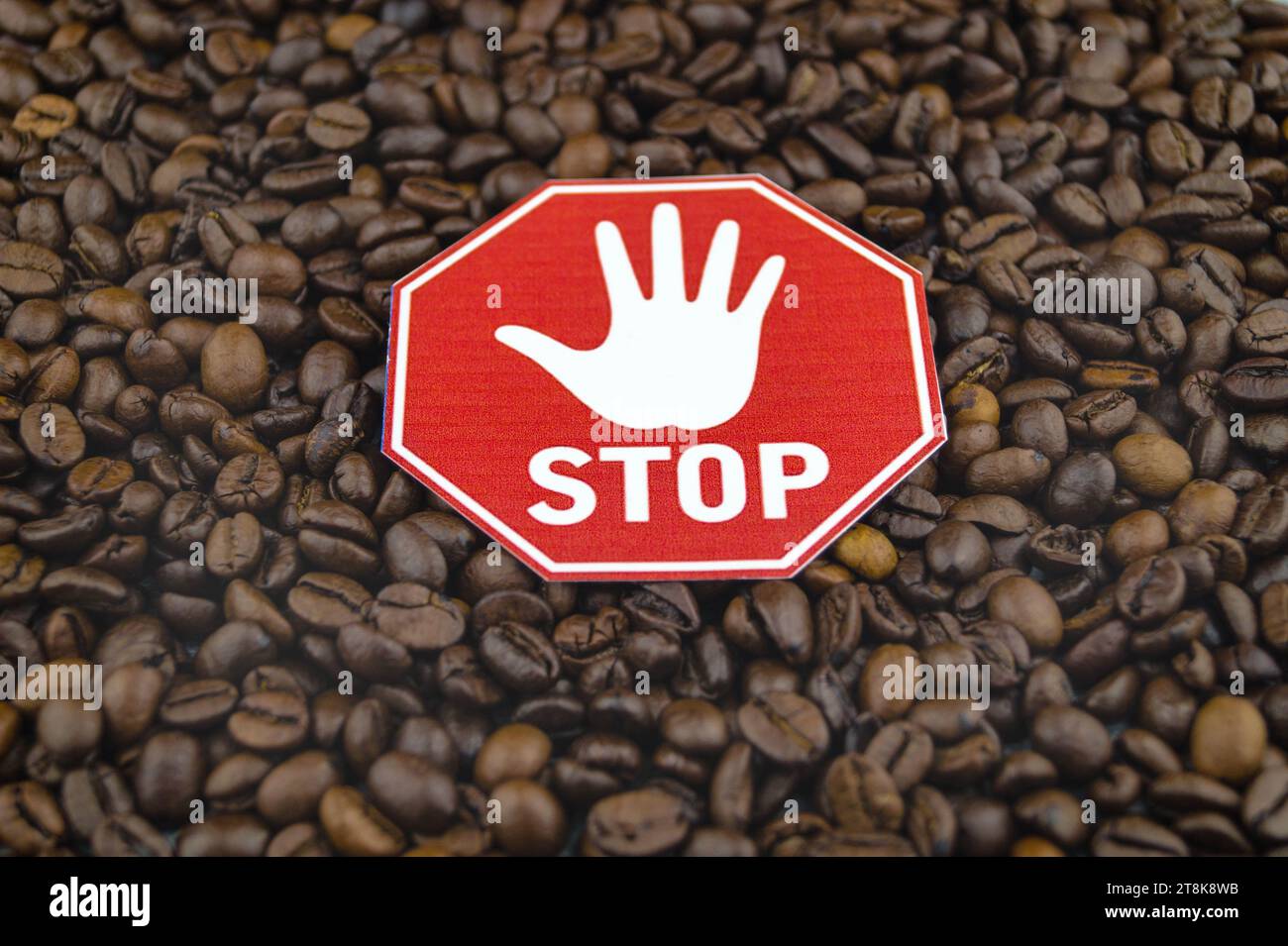 roasted coffee beans with stop sign Stock Photo Alamy