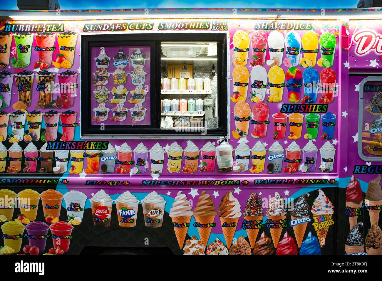 Street vendor wagon selling ice cream sundaes, shaved ice, smoothies