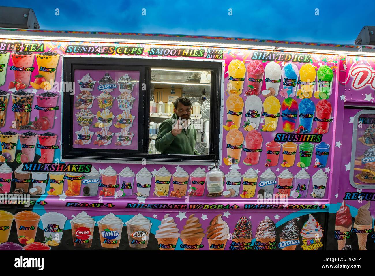 Street vendor wagon selling ice cream sundaes, shaved ice, smoothies