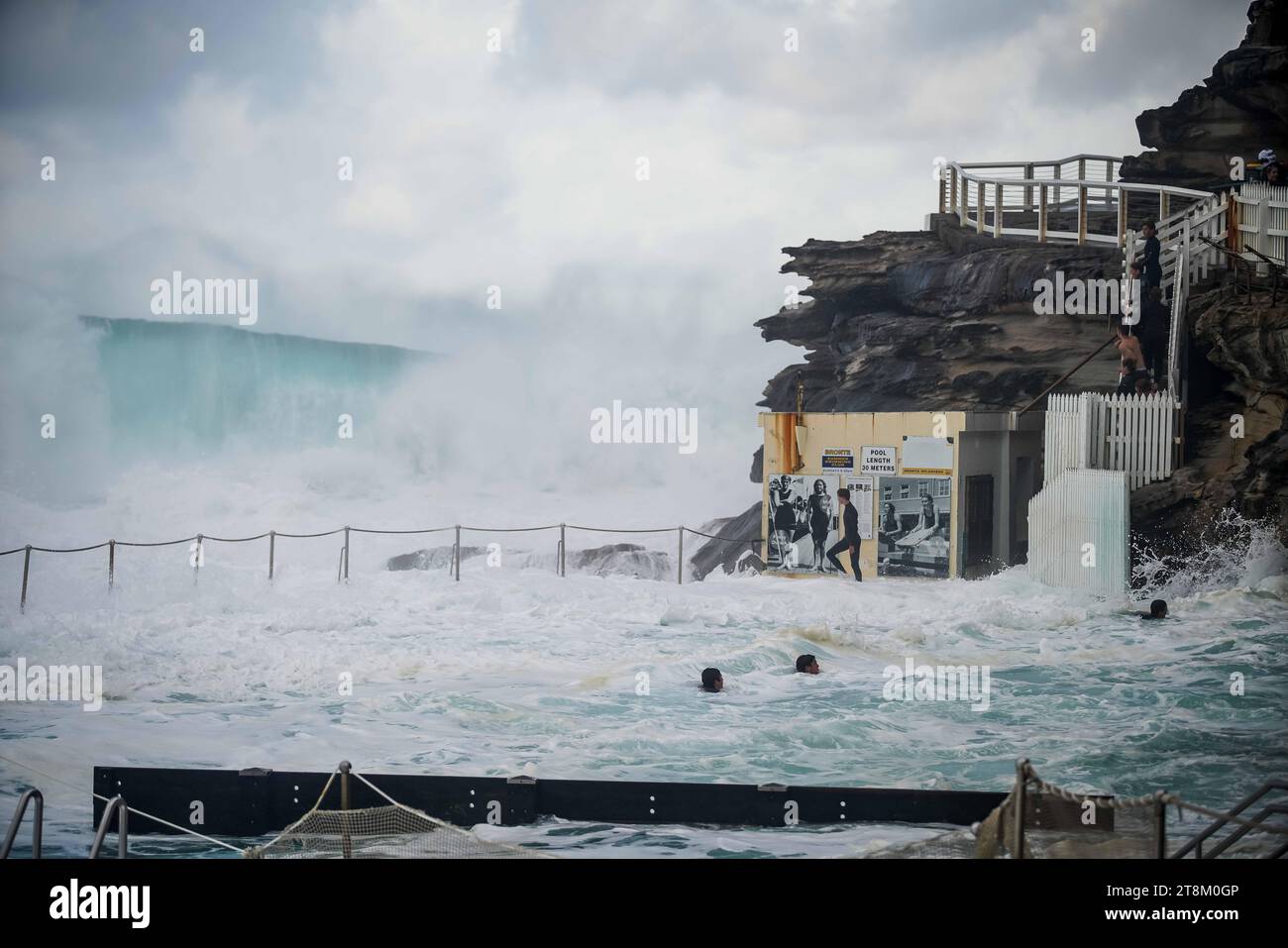 A huge wave breaks near the Bronte ocean pool. Stock Photo