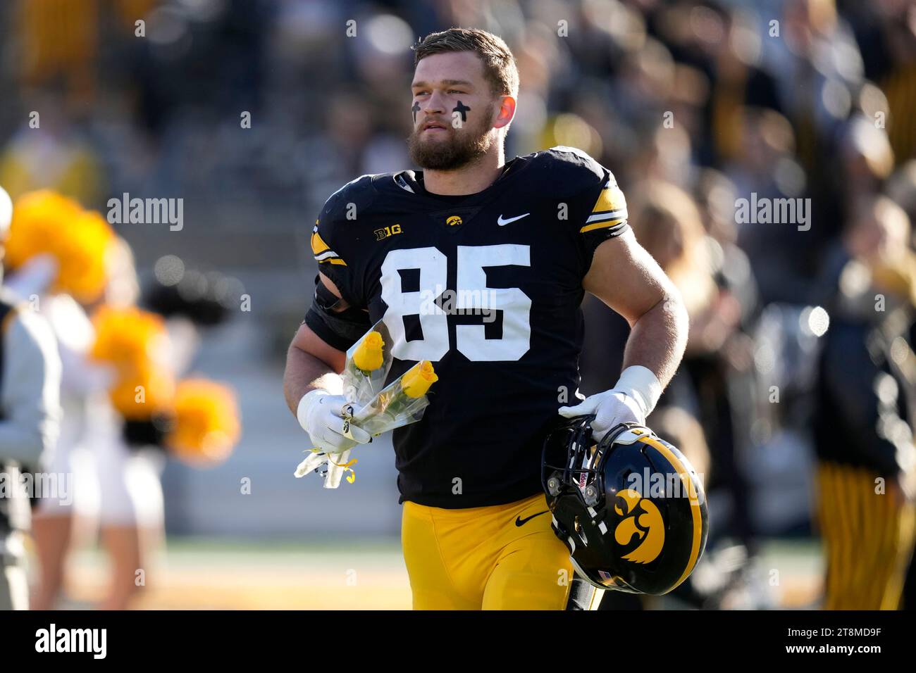 Iowa defensive lineman Logan Lee (85) runs onto the field during senior ...