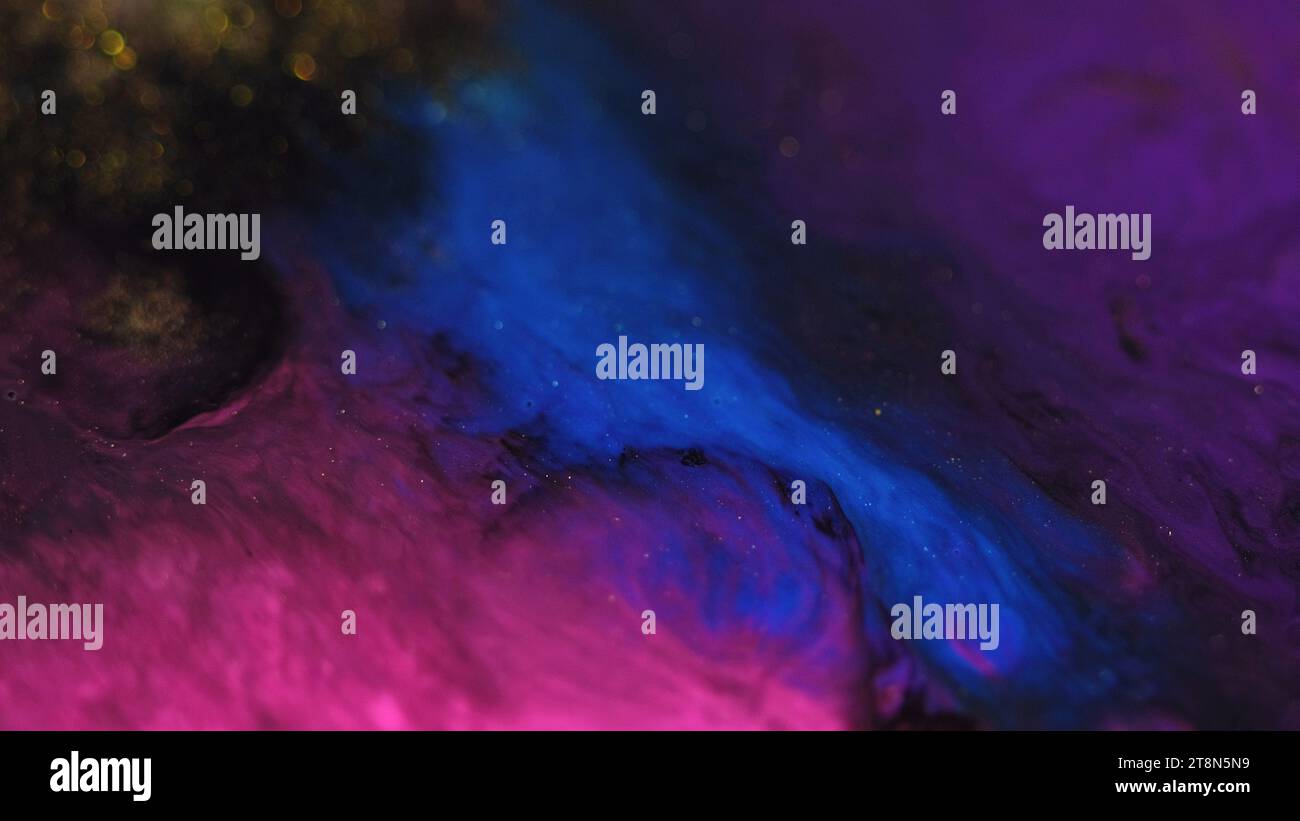 Paint splash glitter mist texture blue purple dark Stock Photo - Alamy