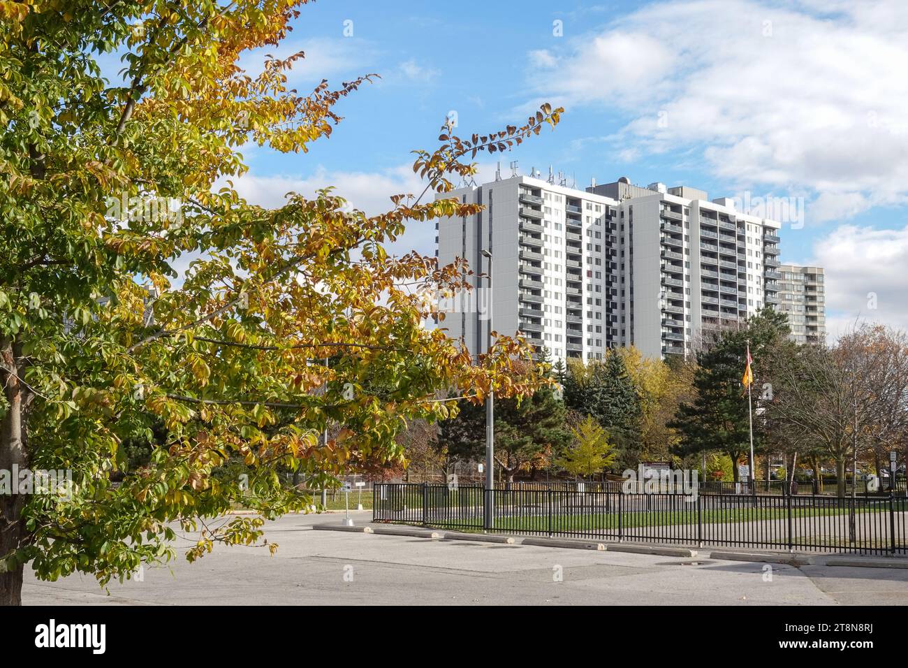 Toronto apartment building, blue sky, fall season Stock Photo