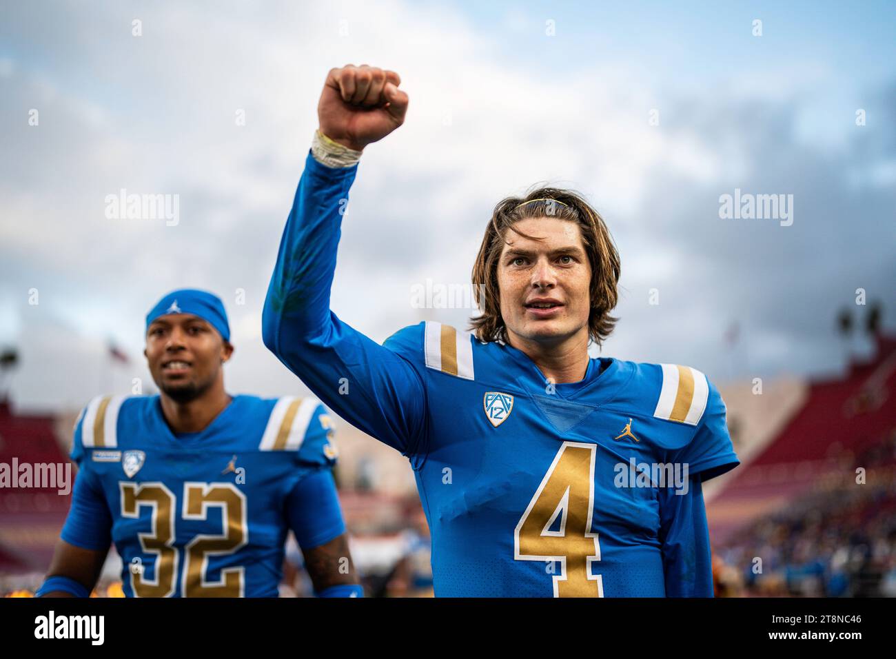 UCLA Bruins quarterback Ethan Garbers (4) reacts to a victory after a