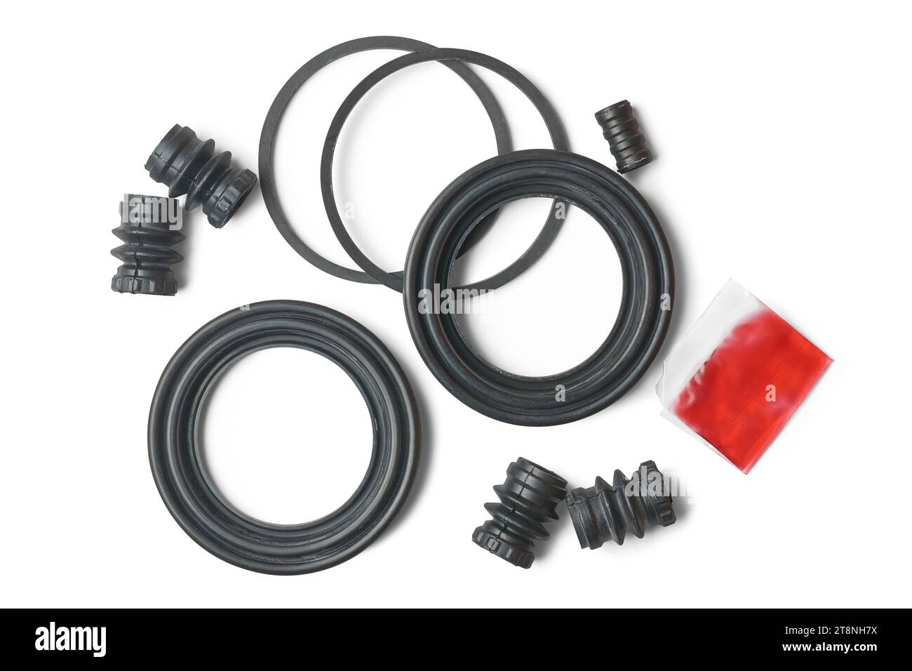 closeup of new brake caliper pin piston boots with seal and grease