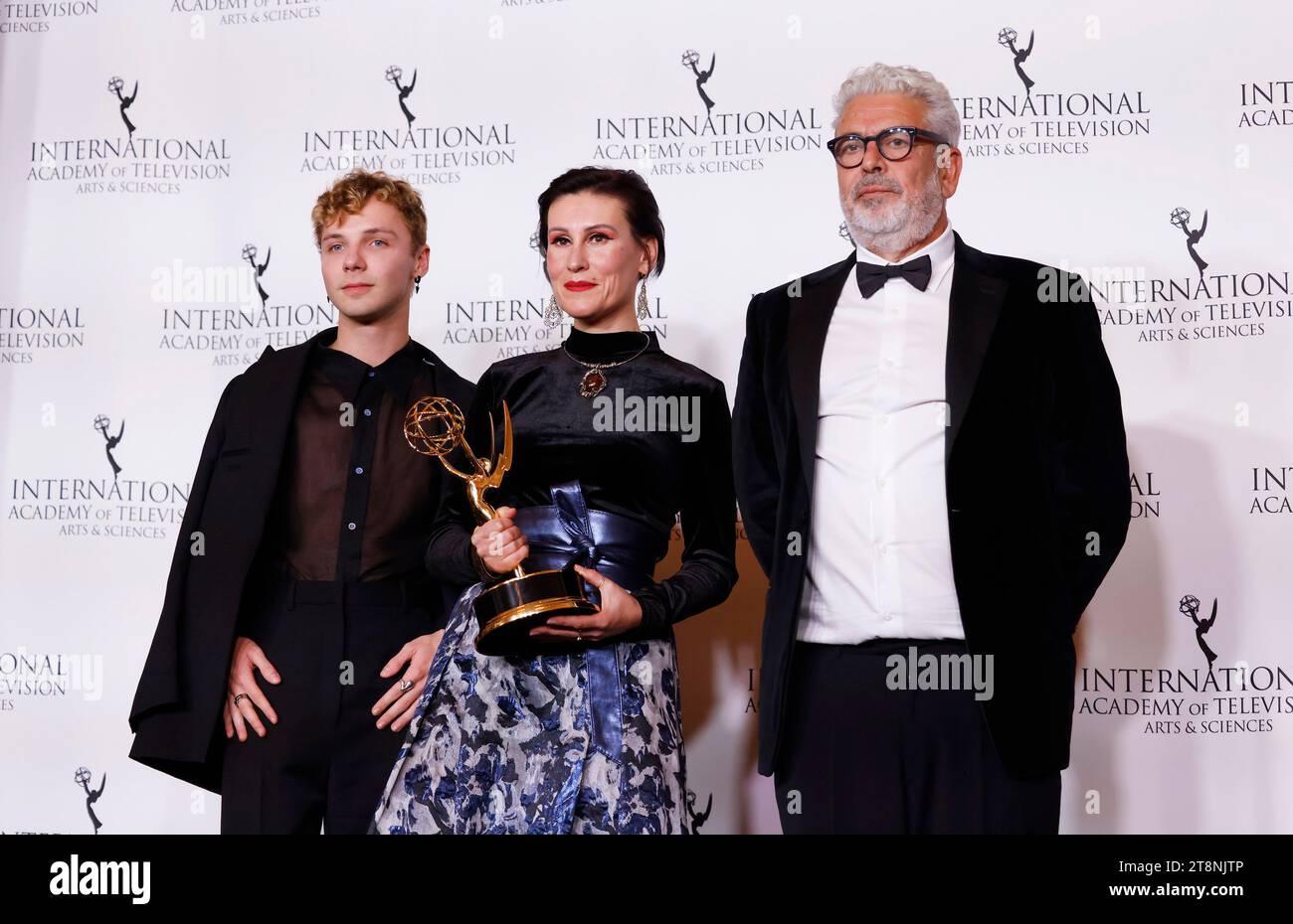 New York, United States. 20th Nov, 2023. Belgian actor Jeremy Gillet, director Ovidie and producer Marc Berdugo pose with the International Emmy award for 'Short-Form Series' for the French show 'Des Gens Bien Ordinaires (A Very Ordinary World)' in the press room at the 51st International Emmy Awards at New York Hilton Midtown in New York City on Monday, November 20, 2023. Photo by John Angelillo/UPI Credit: UPI/Alamy Live News Stock Photo
