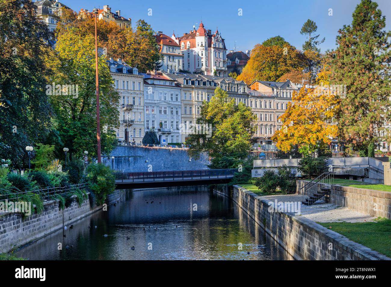 Typical facades on the banks of the Tepla in autumn, Karlovy Vary, West Bohemian Spa Triangle, Karlovy Vary Region, Bohemia, Czech Republic, Unesco Stock Photo