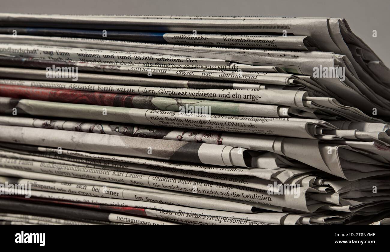 Collected daily newspapers Stock Photo