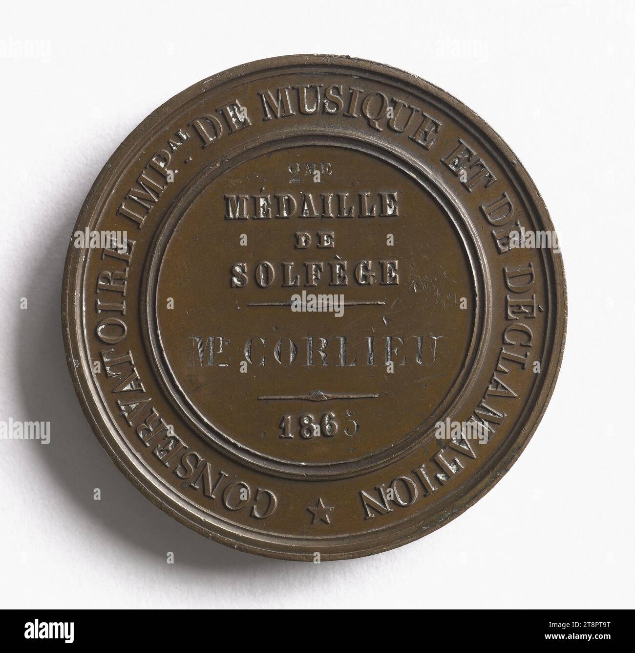 Second medal of solfeggio of the Imperial Conservatory of music and declamation attributed to Corlieu,1865, Barré, Albert-Désiré, Engraver in medals, In 1865, Numismatic, Medal, Dimensions - Work: Diameter: 5.1 cm, Weight (type dimension): 58.6 g Stock Photo