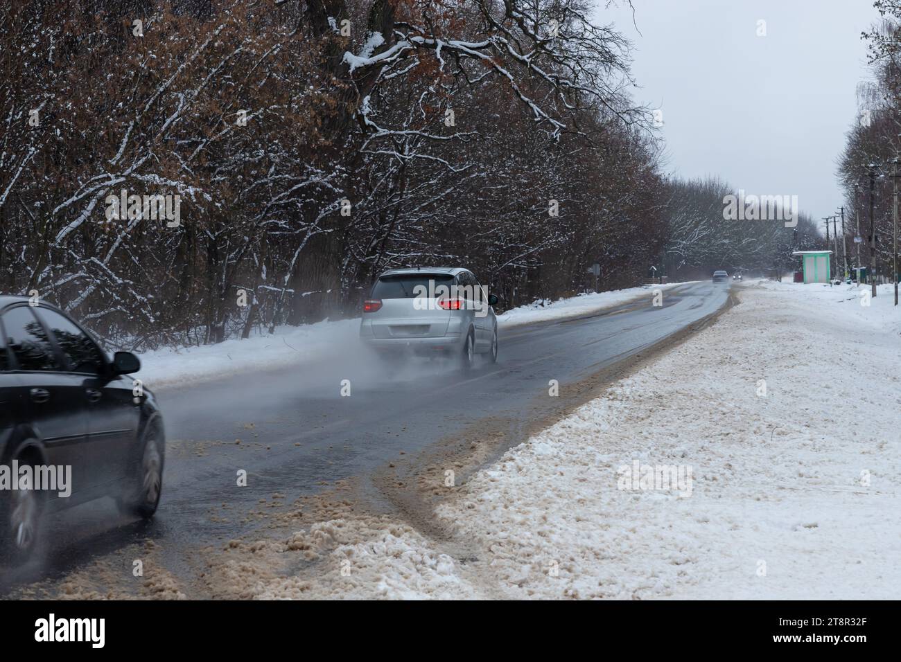 driving in winter after a snowfall, ice on the road, temperatures below zero. Stock Photo