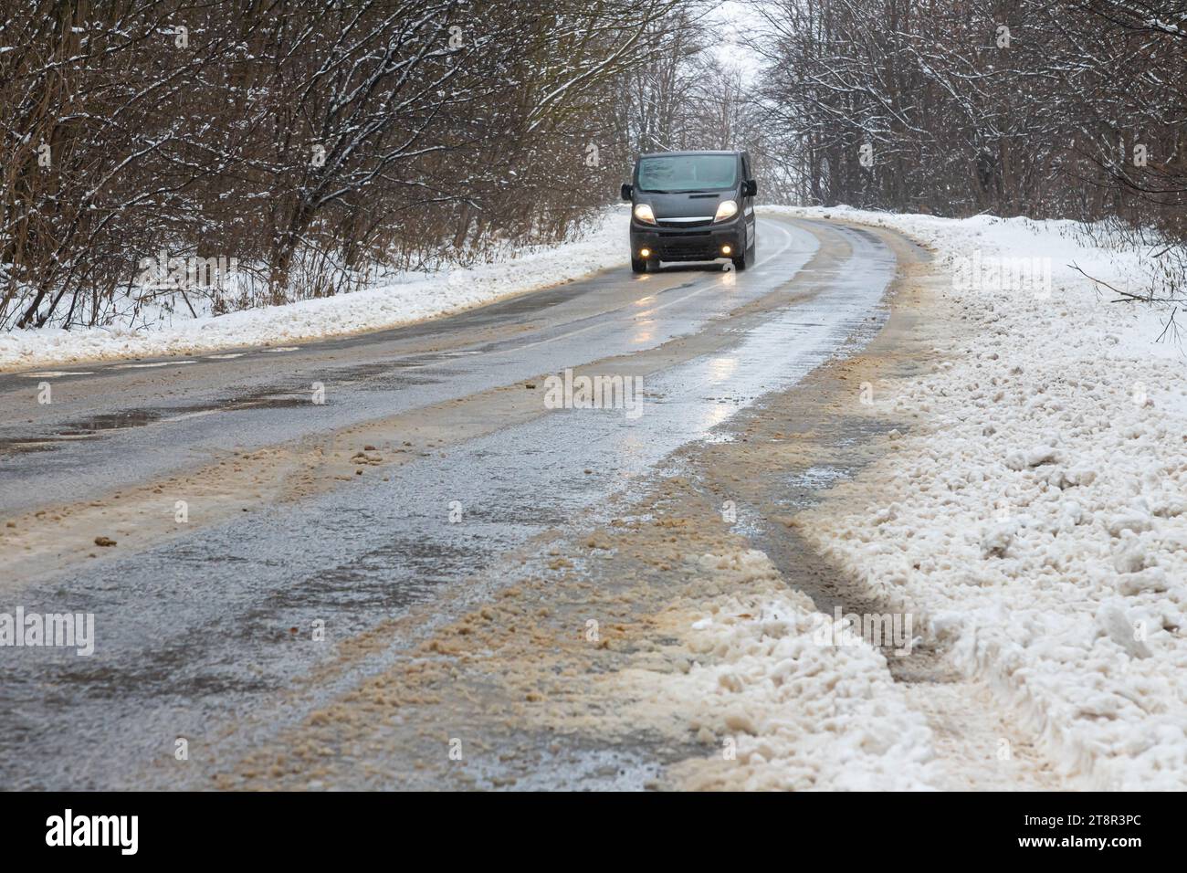 driving in winter after a snowfall, ice on the road, temperatures below zero. Stock Photo