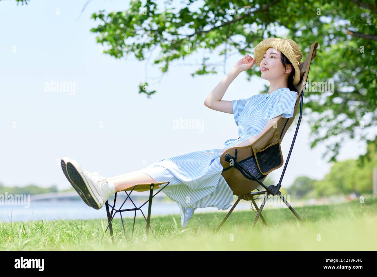 Japanese woman relaxing outside hi-res stock photography and images - Alamy