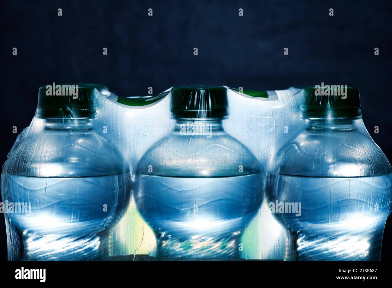 Detail of plastic bottles with water in packaging Stock Photo