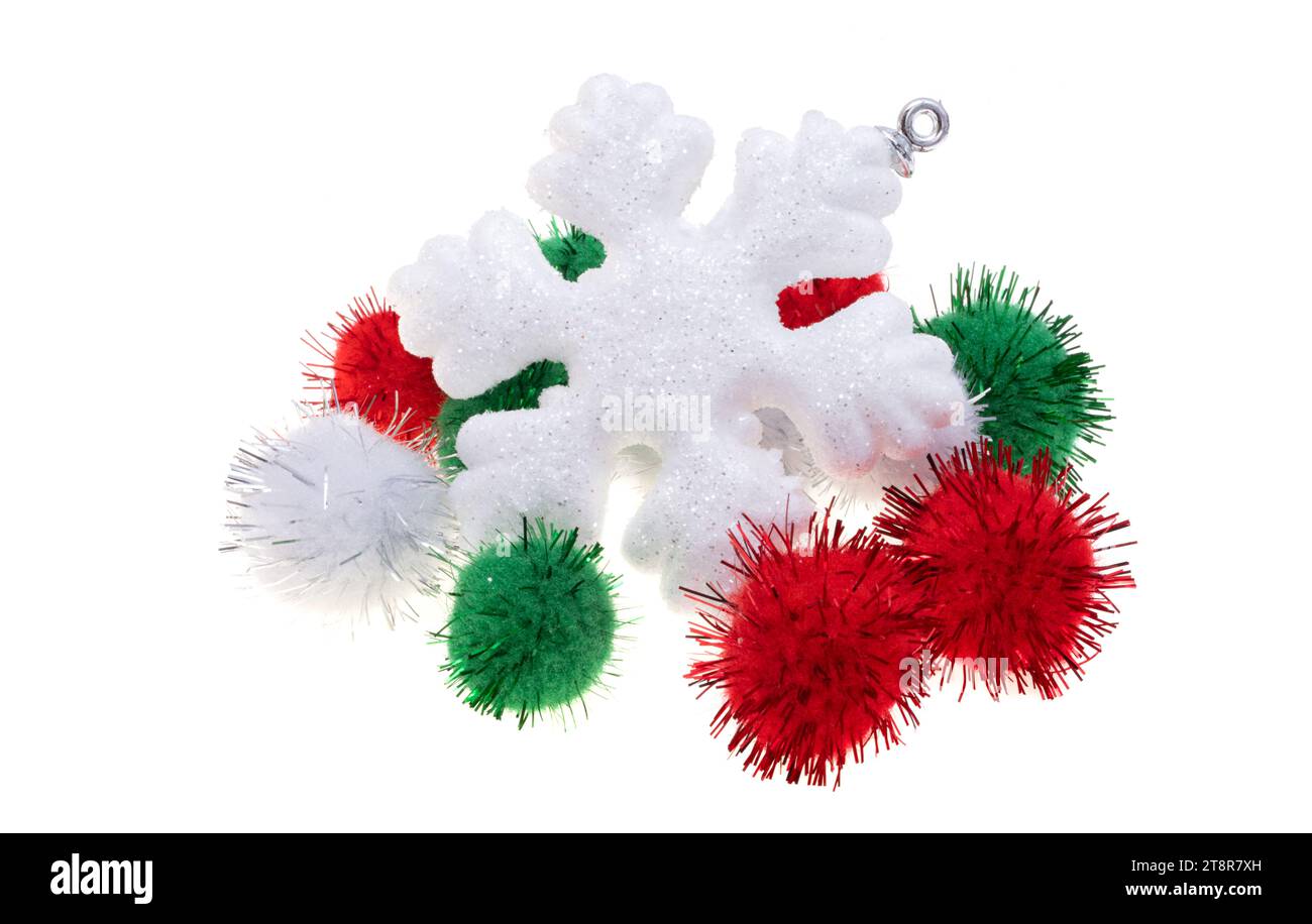 snowflake with colored pompom balls on white background Stock Photo
