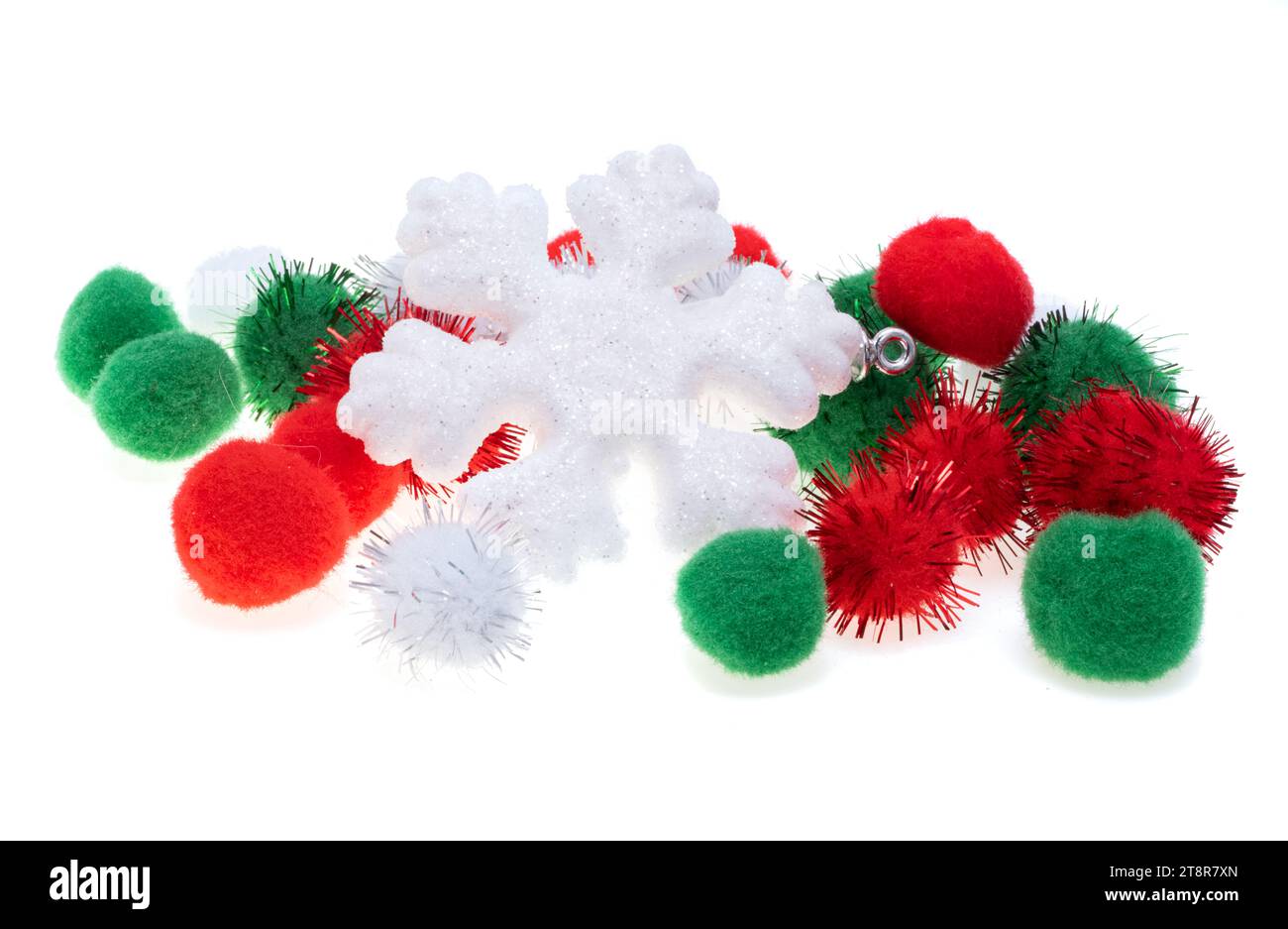 snowflake with colored pompom balls on white background Stock Photo