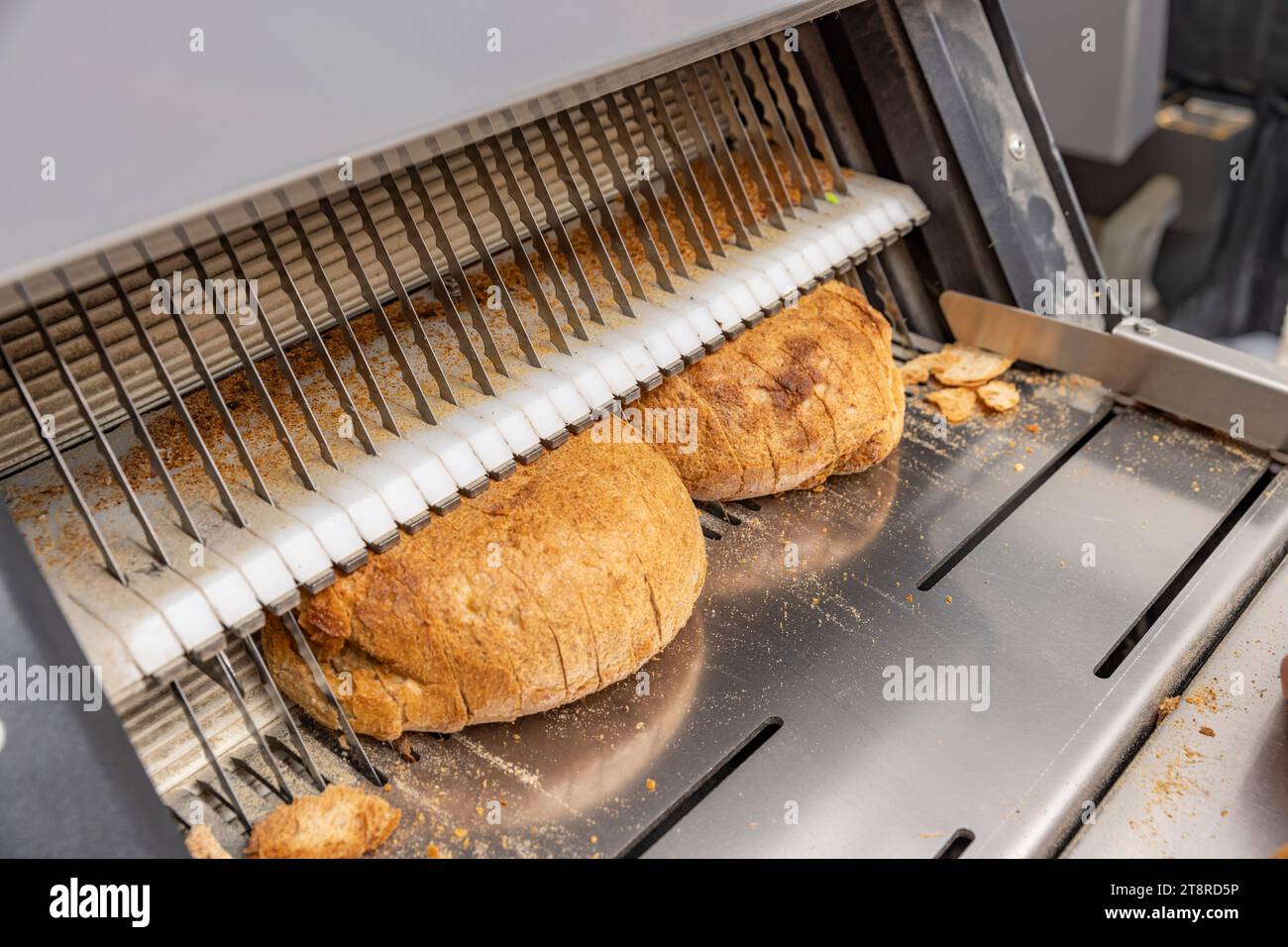 Sliced Bread In Cutting Machine Stock Photo - Download Image Now - Bread  Slicer, Baked, Bakery - iStock