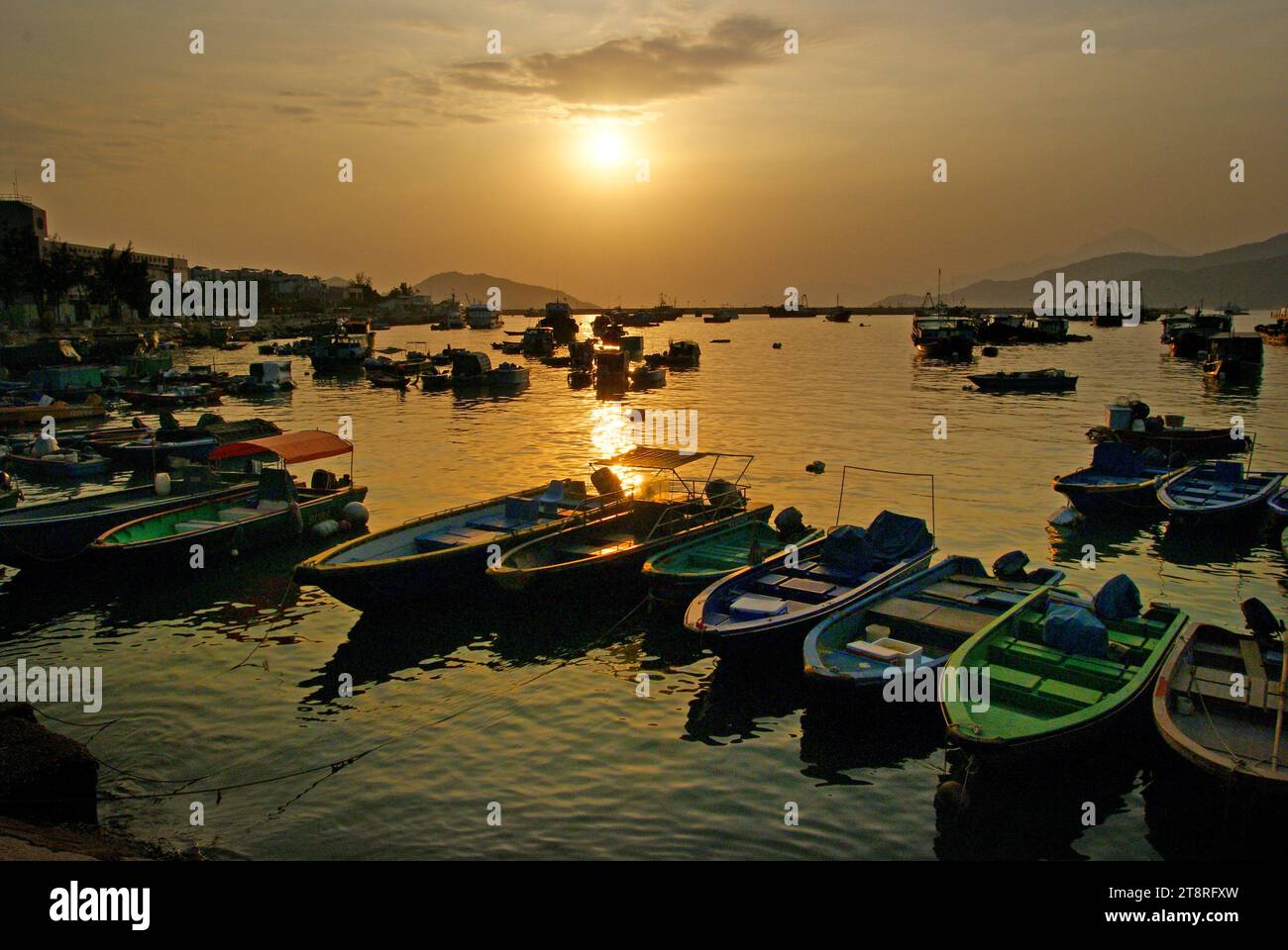 Cheung Chau Island.Hong Kong, Cheung Chau Island has long been one of Hong Kongs most popular island retreats. Smaller than Lantau but bigger than nearby Peng Chau, Cheung Chau offers more to do than clamber around on rocks and play castaway but is still several gears down in pace from the big city Stock Photo