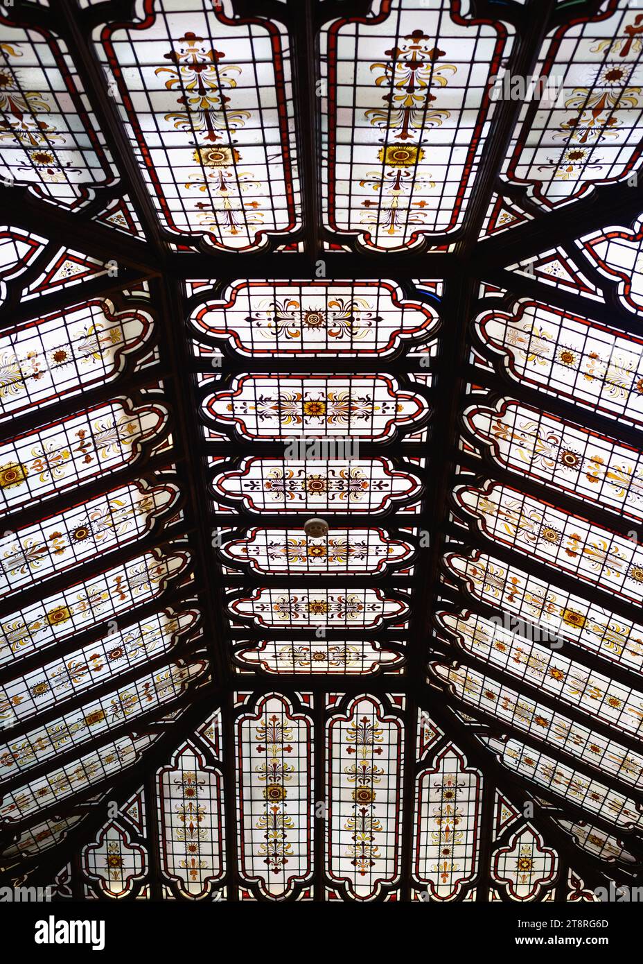 The intricate stainedglass window in the ceiling of Bletchley Park