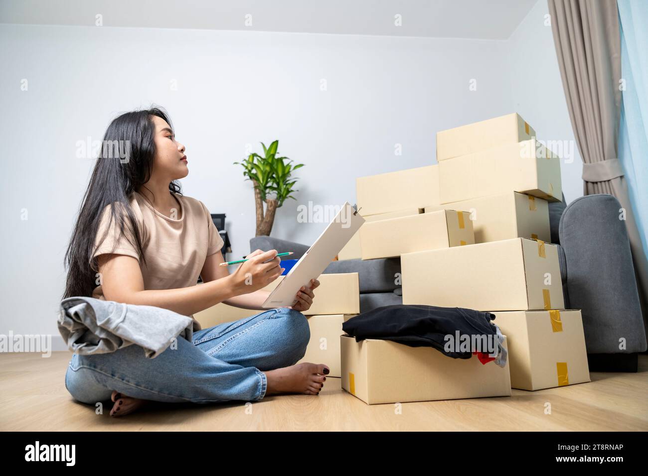 Unrecognizable woman packing suitcase hi-res stock photography and ...