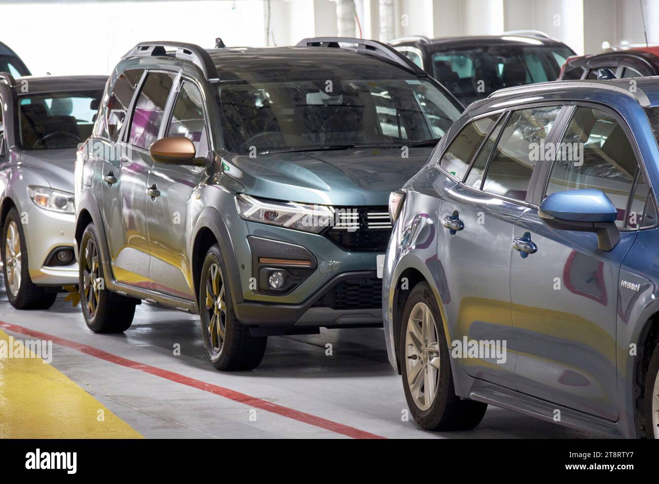 passenger cars on the top vehicle deck on board a stena line irish sea ferry uk Stock Photo