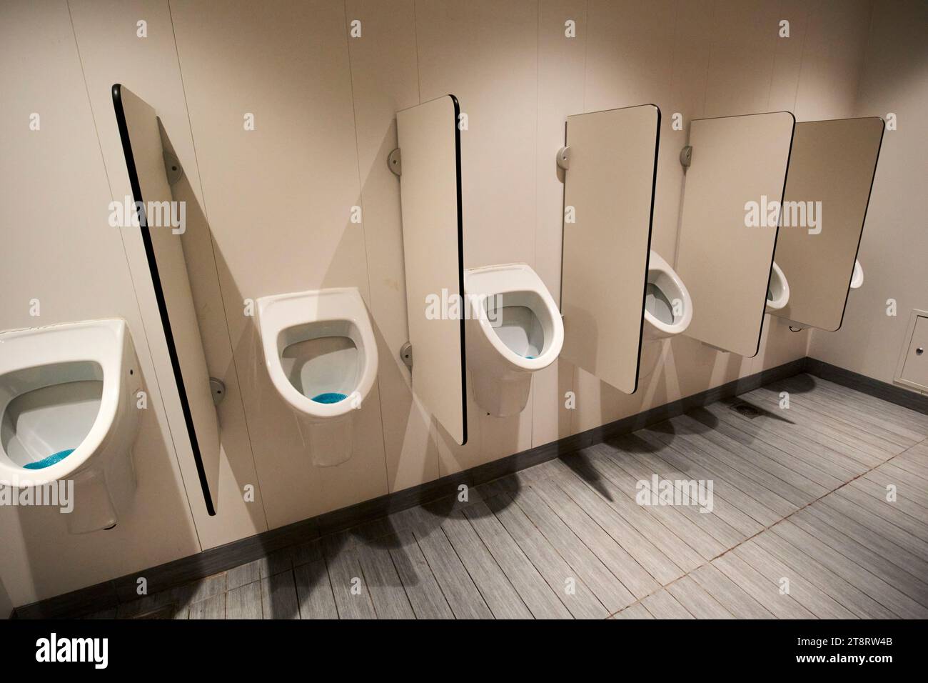 row of urinals in mens toilet on board a stena line irish sea ferry uk Stock Photo Alamy