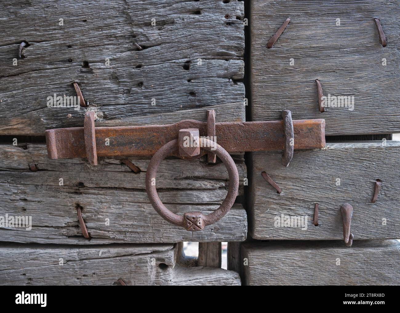 the wooden main gate of the restored Hay Castle in Hay-on-Wye, Powys, Wales, UK Stock Photo