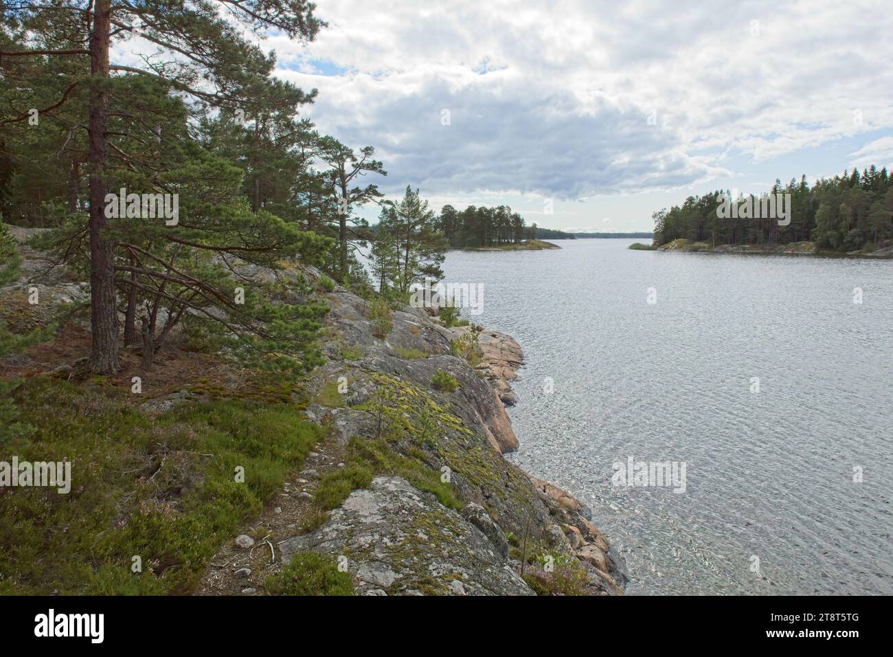 Rocky seashore on the island of Linlo in cloudy autumn weather, Kirkkonummi, Finland. Stock Photo