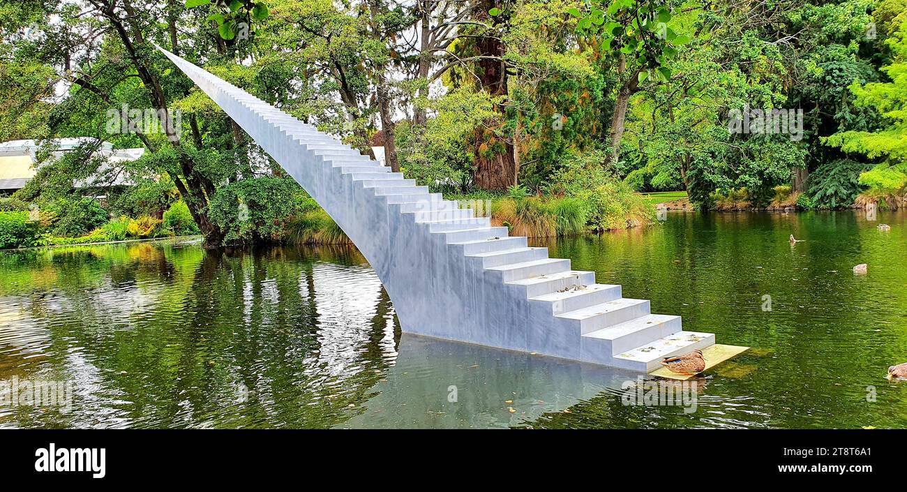 Diminish and Ascend i, Diminish and Ascend is by Auckland, New Zealand-based David McCracken. The piece is a 13 metre receding perspective staircase made from aluminium, which has been installed in the Kiosk Lake of the Botanic Gardens Christchurch, New Zealand New Zealand Stock Photo