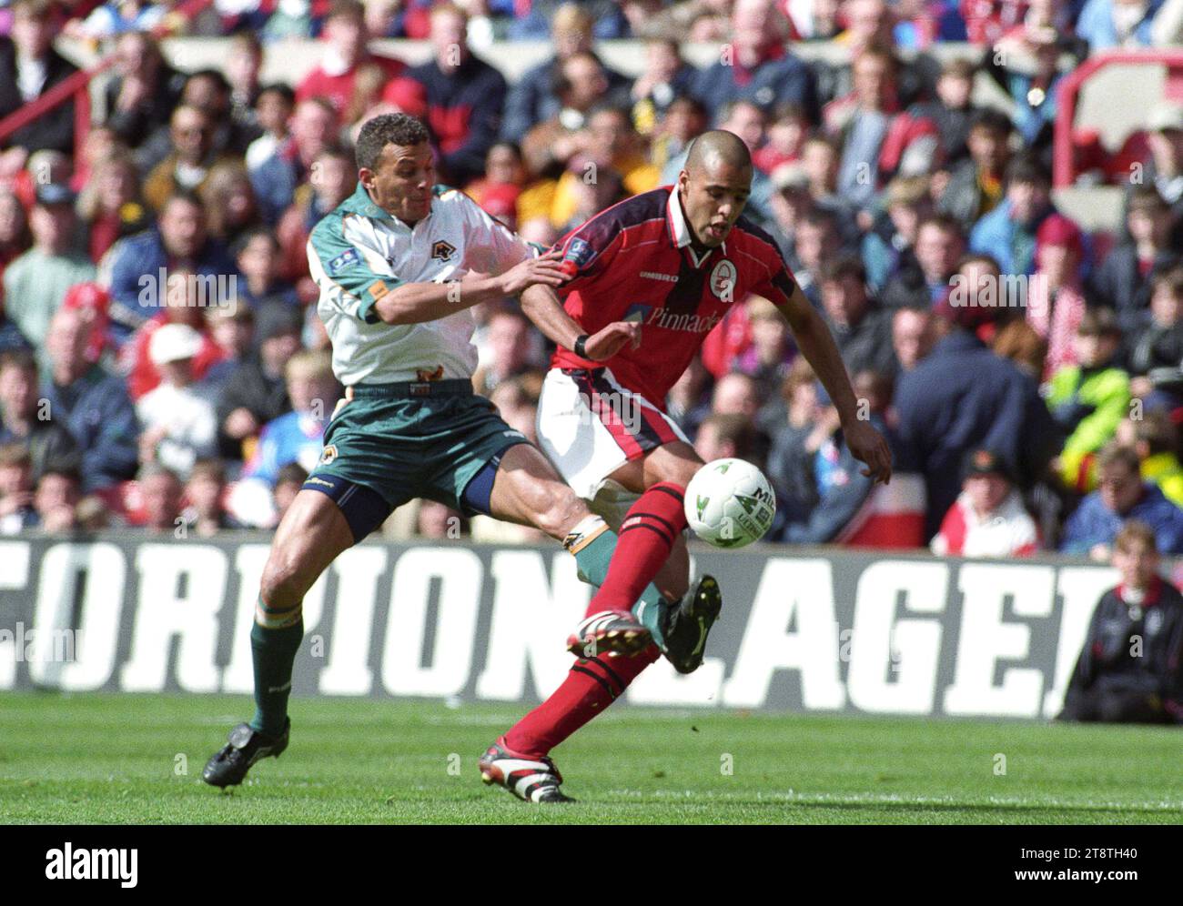 Nottingham Forest v Wolverhampton Wanderers 13/4/98 3-0 Keith Curle and Pierre van Hooijdonk Stock Photo
