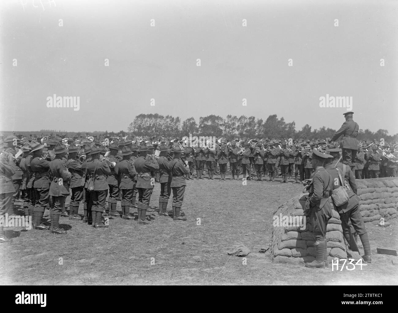 The massed bands at the New Zealand Divisional Band Contest, France, The massed bands playing at the New Zealand Divisional Band Contest in Authie, France, during World War I. Photograph taken 27 July 1918 Stock Photo