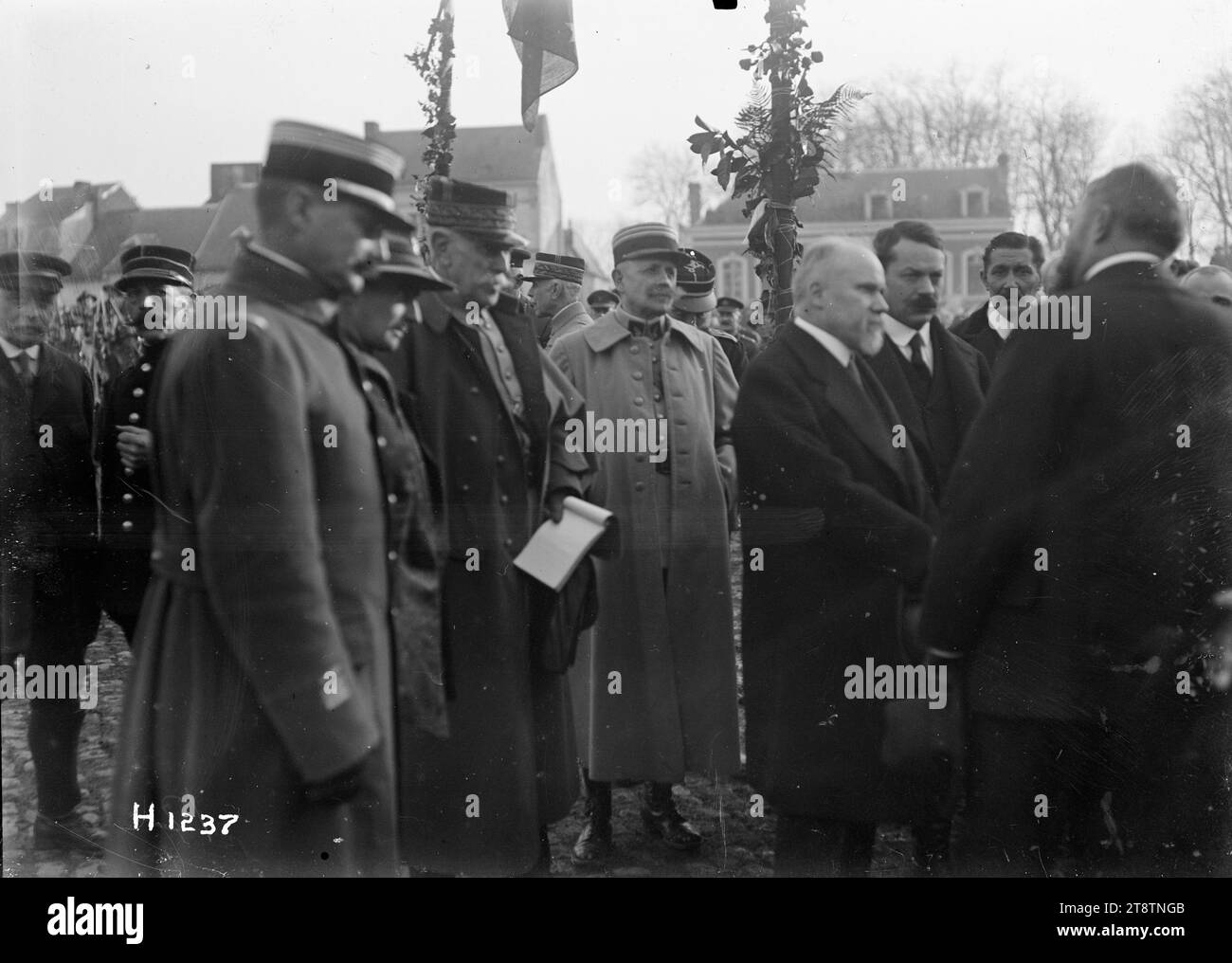 Arrival of President Poincare at Le Quesnoy, Arrival of President Raymond Poincare of France (right of centre) in Le Quesnoy. Photograph taken 10 November 1918 Stock Photo