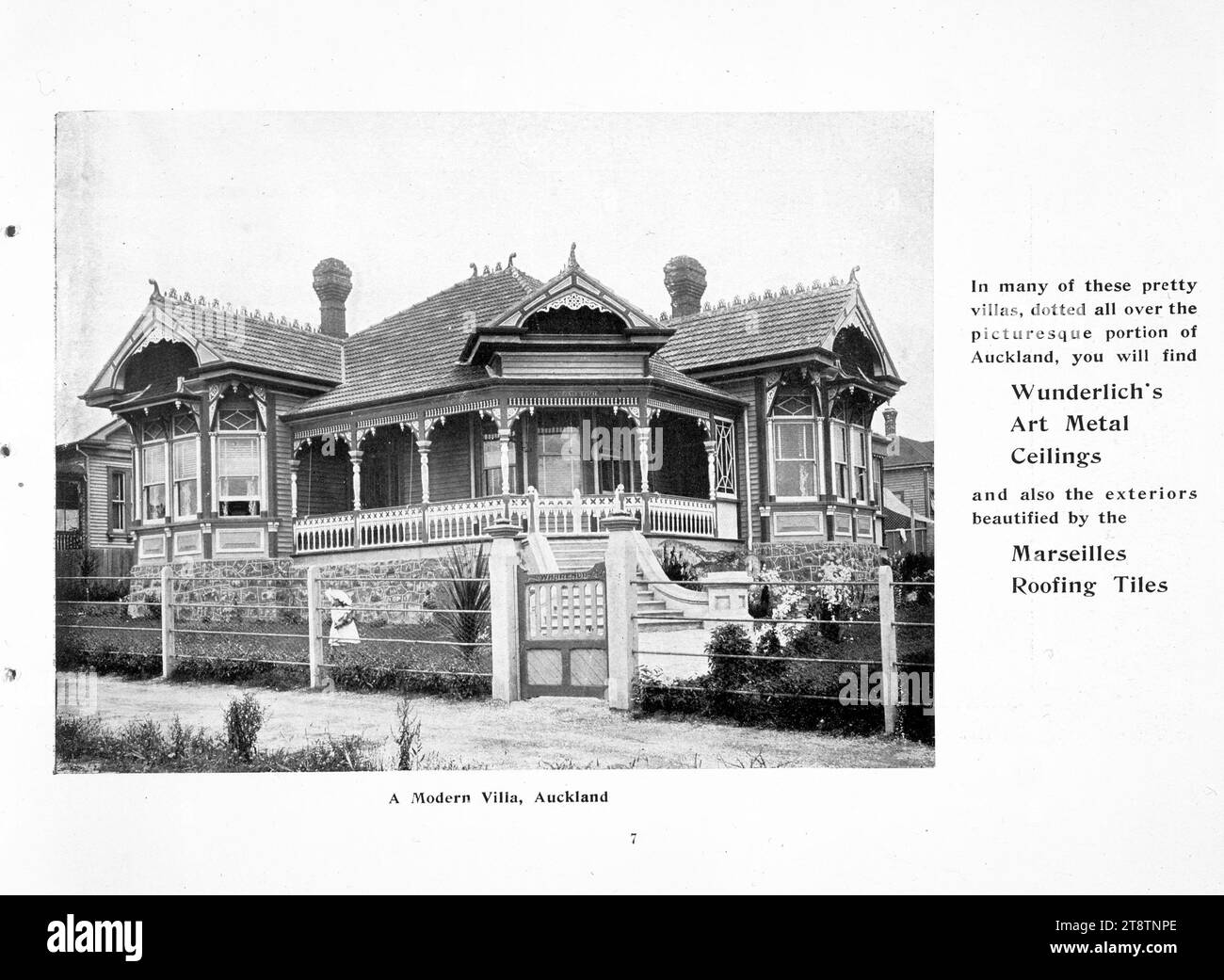 Briscoe & Co Ltd: A modern villa, Auckland, New Zealand. In many of these pretty villas, dotted all over the picturesque portion of Auckland, New Zealand, you will find Wunderlich's art metal ceilings, and also the exteriors beautified by the Marseilles Roofing Tiles. 1906-1908, Shows a wooden villa on stone foundations seen from the street, with a verandah, and tiled roof with decorated ridgepole Stock Photo
