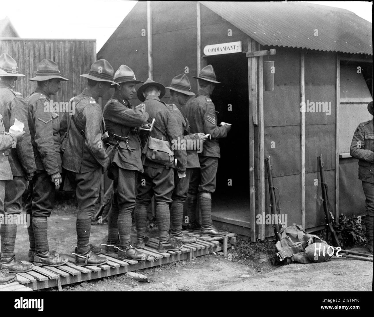 New Zealand troops drawing pay at the reinforcement camp before going