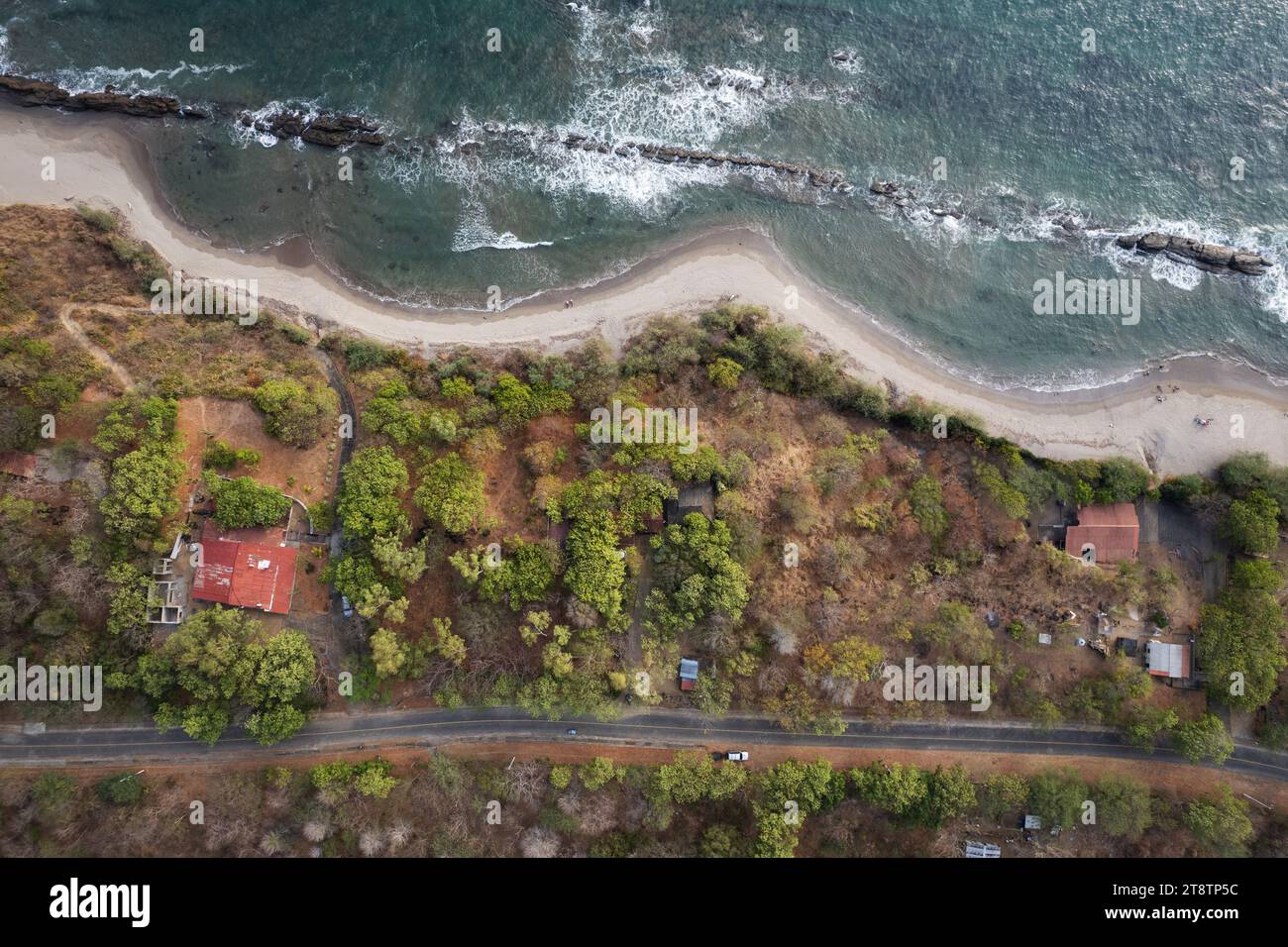 Tropical ocean beach bay top above drone view Stock Photo