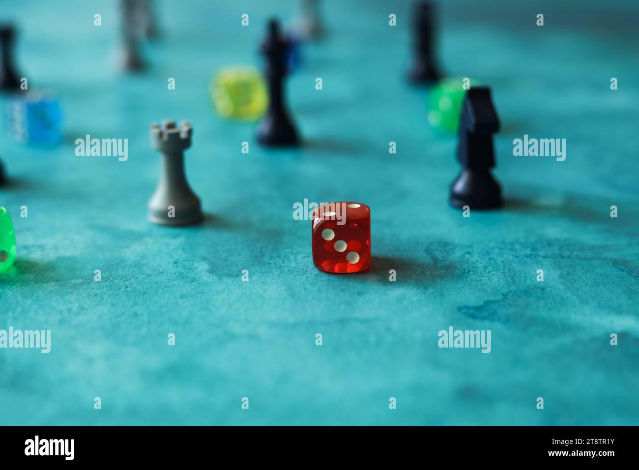 chess pieces and colorful dice on a blue watercolor background pattern Stock Photo